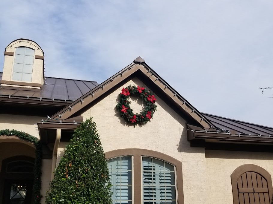 Christmas lighted wreath installation in San Antonio, showcasing festive holiday decor.