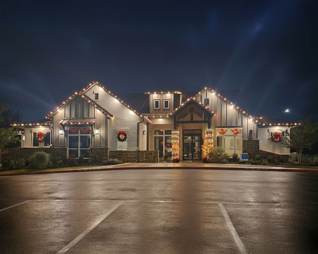 David Weekley Homes commercial holiday lighting display in San Antonio showcasing festive designs and vibrant colors.