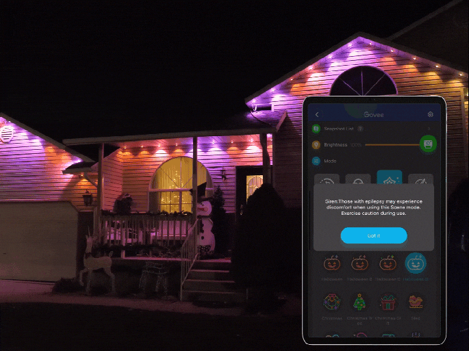 Govee outdoor permanent lights illuminating a home's exterior with colorful LED display for year-round decoration